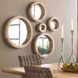 A grouping of porthole mirrors