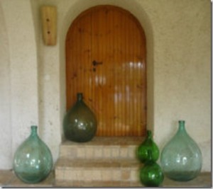 Assortment of demijohns in different hues