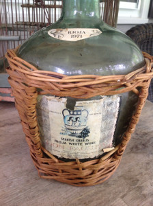 Demijohn enclosed in wicker