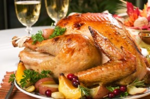 Feasting backed turkey on holiday table ready to eat